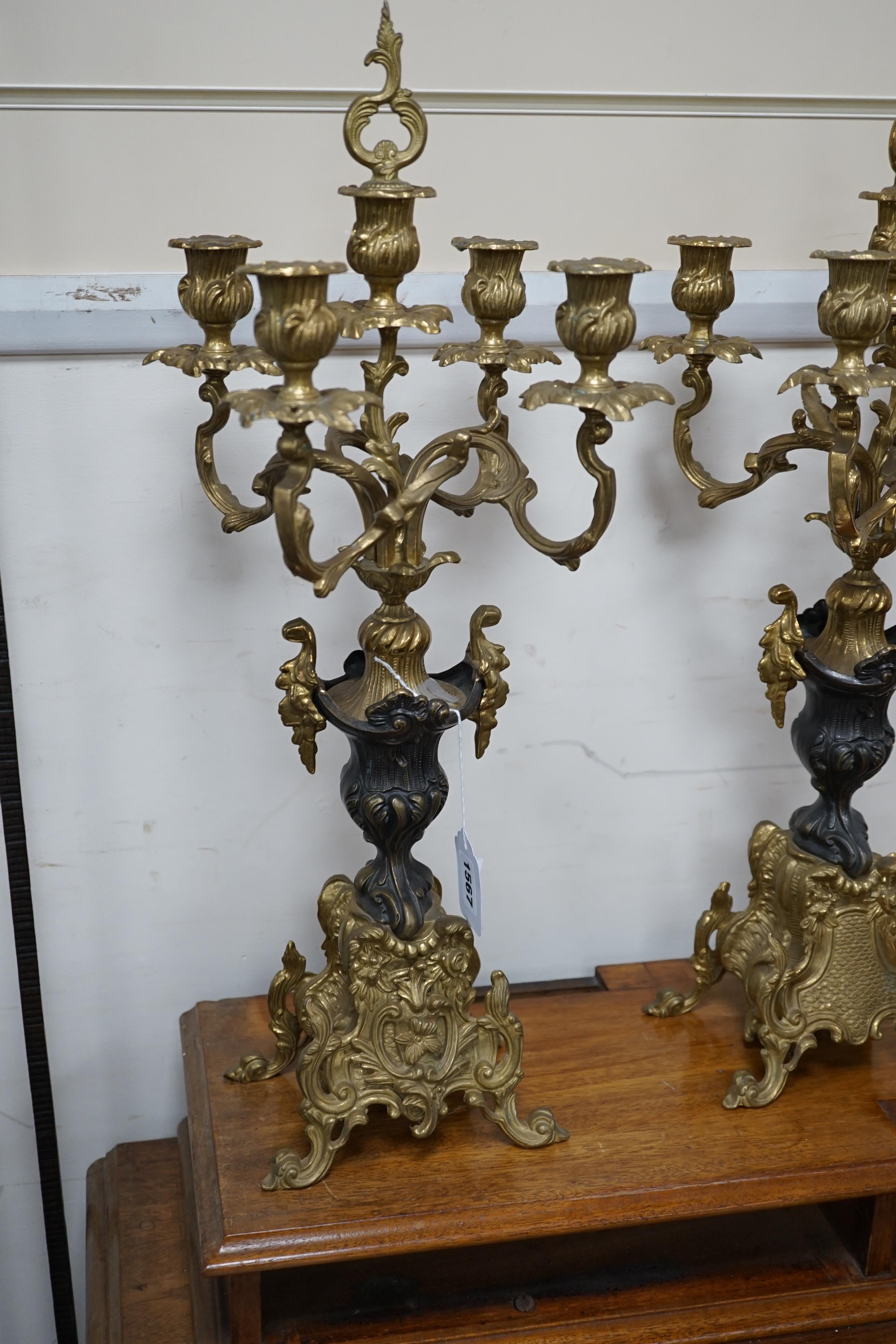 A pair of French brass five light candelabra, 58cm high